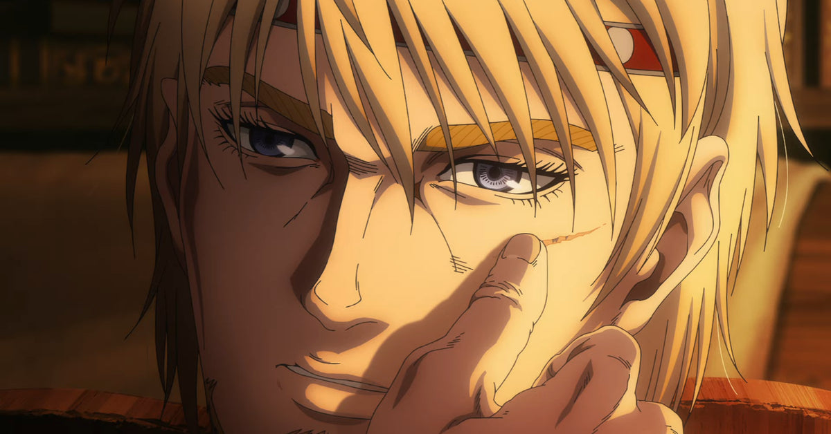Visual oficial de Vinland Saga con Thorfinn en primer plano sobre el paisaje vikingo